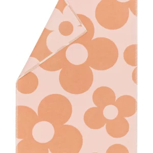 Plaid douillet pour bébé, motif fleuri.